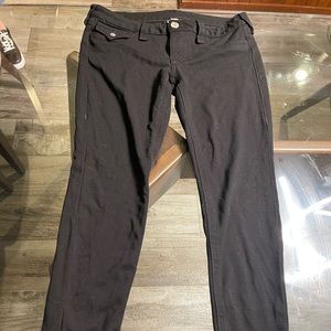 Black jeans, soft material.